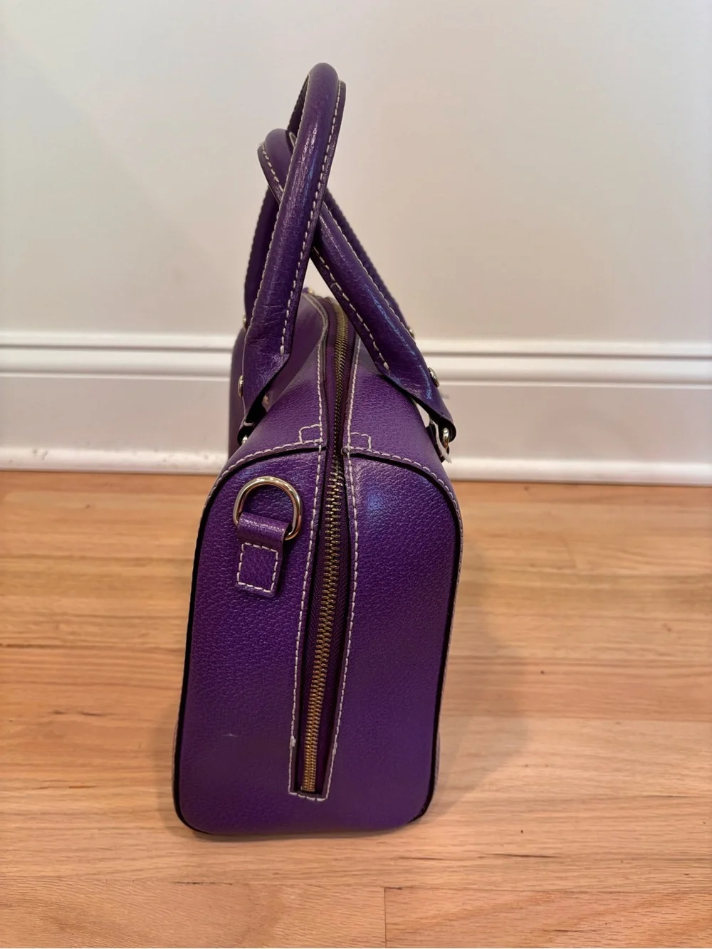 Kate Spade Alessa Wellesley handbag in a vibrant plumberry purple leather